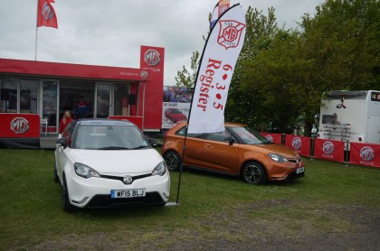 Sheila and Colin Ballard ans Sean Round assisting MG Motor