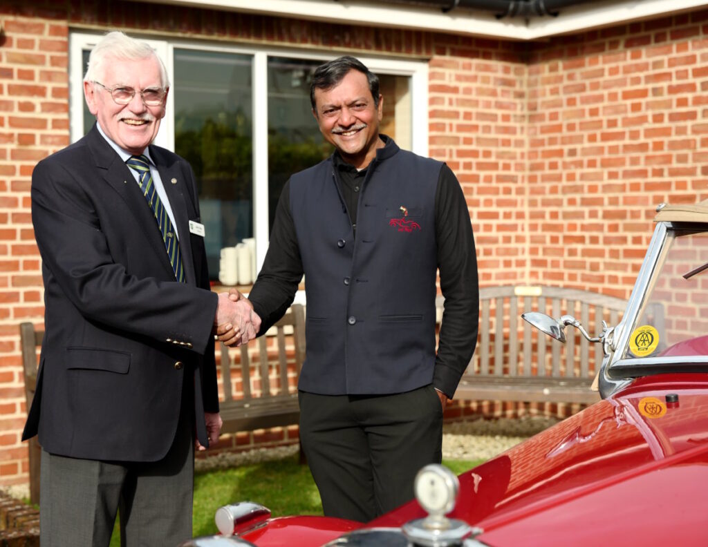 MG Car Club President John Day welcomes Daman Thakore to The MG Car Club, Abingdon.