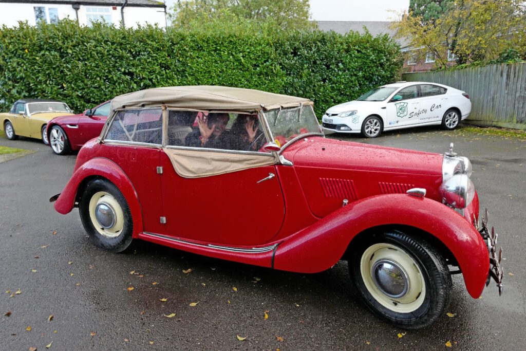 Daman and his daughter Devanshi wave goodbye as they leave the MG Car Club in their Y Tourer